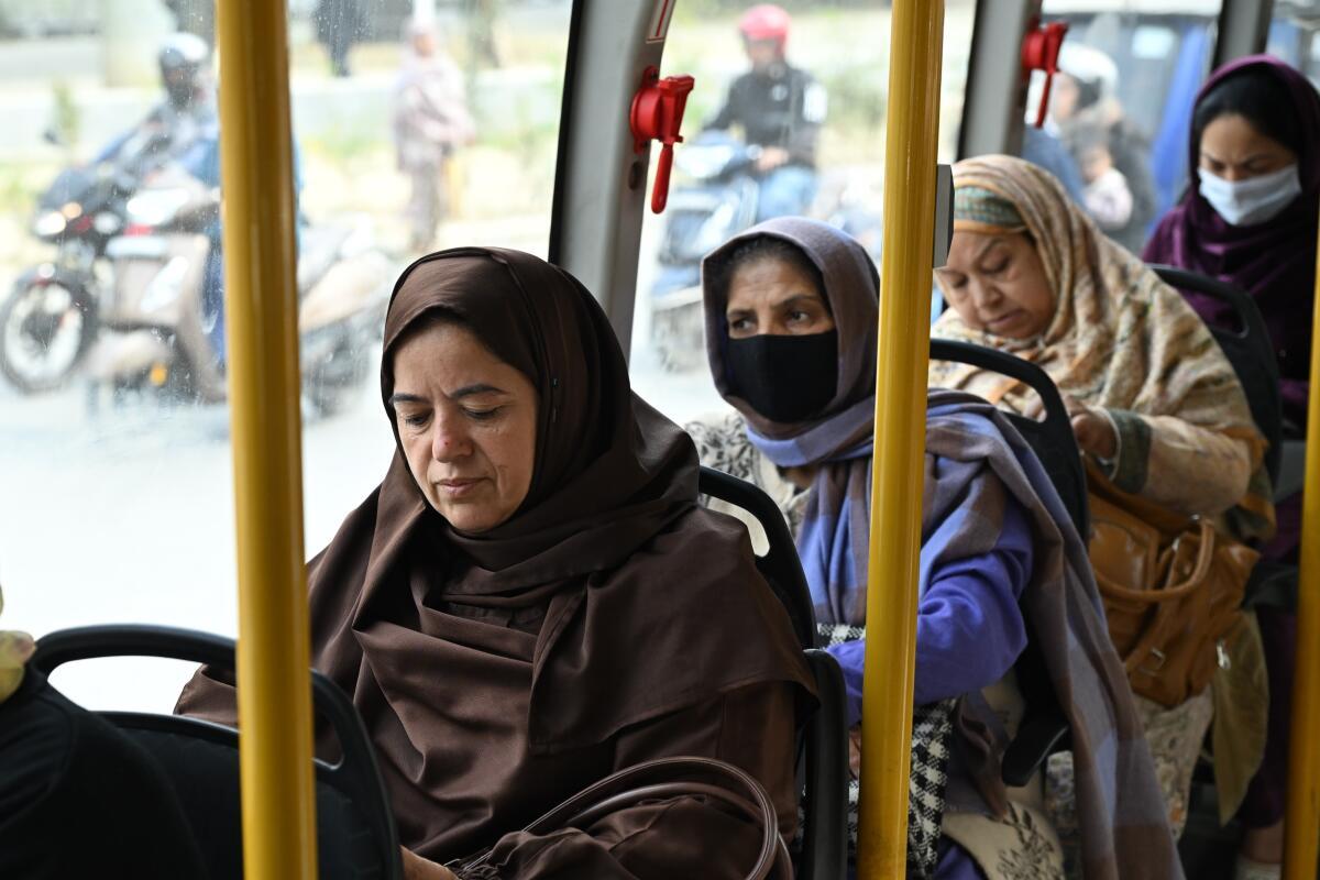Passengers travelling on a state-run bus in Srinagar, J&K, in April 2025.